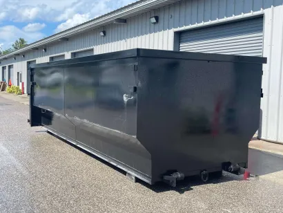 Park N Dump 30 yard roll-off dumpster outside a warehouse